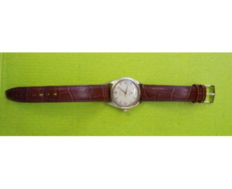 A GENTLEMANS VINTAGE GOLD CASED ROLEX OYSTER PERPETUAL CHRONOMETER WRIST WATCH  ON LEATHER STRAP