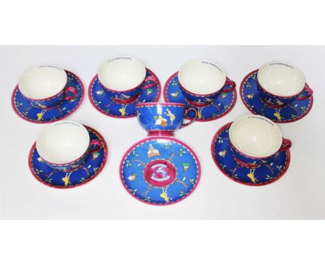 A set of seven Wedgwood Cadbury's Cup Chocolate cups and saucers.Condition:- General wear through age and use, one cup well w