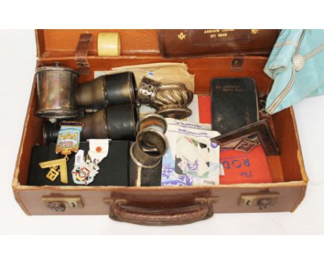 A case of mainly Masonic regalia including a hallmarked silver gilt and enamel jewel, another medallion, other items includin