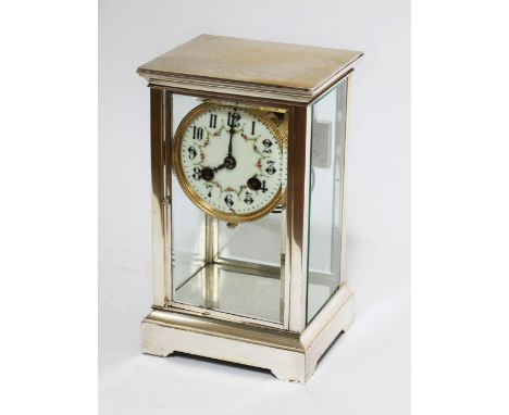 A four glass mantle clock with enamel dial, height 23cm.  