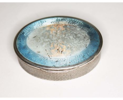 A French silver snuff box with enamel top.  