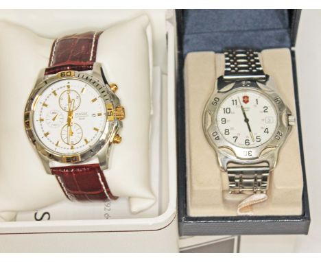Two modern wristwatches; a Swiss Army and a Pulsar.  