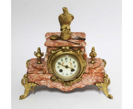 A French marble and gilt metal mounted mantle clock with enamel dial, length 32cm.Condition:- General wear through age and us