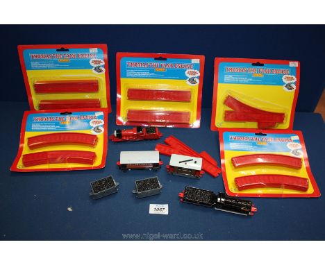 A Hornby ''Thomas The Tank Engine'' train and track (as new) including track as well as Donald The Engine, Thomas Engine, two