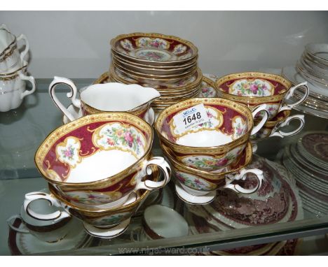A Royal Albert 'Lady Hamilton' part Teaset including six cups, five saucers, seven side plates, bread/ butter plate, sugar bo