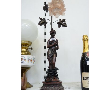 A figurine table lamp