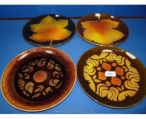 Four Poole Pottery 'Aegean' Plates, all in brown but with different patterns.
