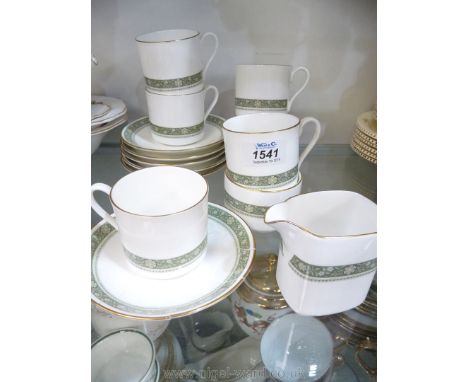 A Royal Doulton Rondelay part Teaset including milk jug, sugar bowl, six cups and saucers, one saucer being badly repaired.