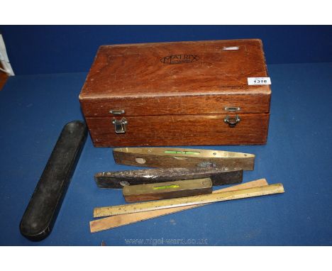 A wooden Box made by Matrix Tool Co. including spirit levels (warranted no 1626), J.R. Rabone and Sons.