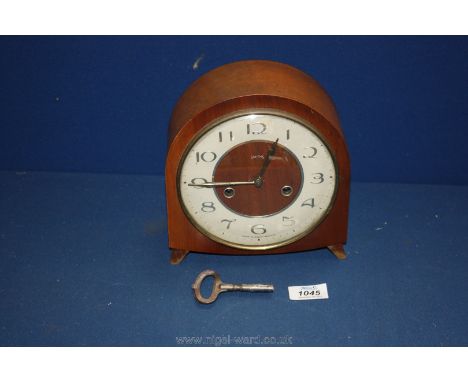 A Smiths chiming mantle Clock, with keys.