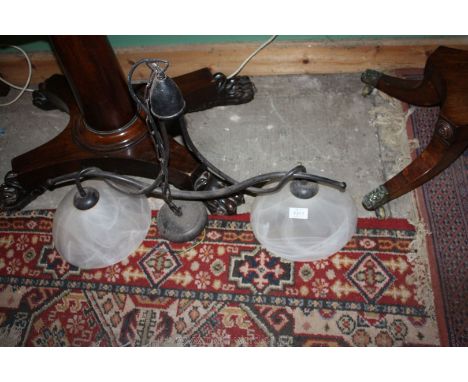A black double steel ceiling light with a glass shade.