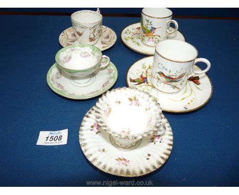 Two Copeland Cups and saucers, a Dresden cabinet Cup and saucer, an unmarked cabinet Cup and saucer and a Royal Doulton cabin