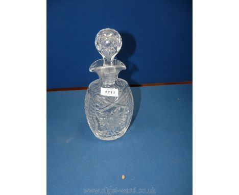 A cut glass oval shaped Decanter.