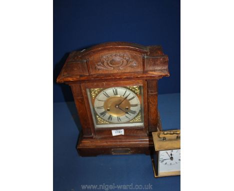 Two clocks, one wooden with inscription 50 mile handicap 1st prize and one carriage clock, both a/f.