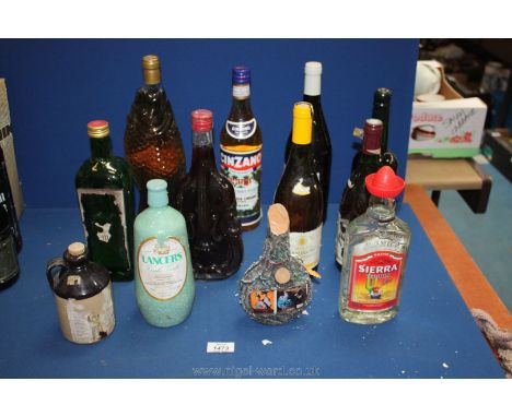 Miscellaneous bottles including wines, a bottle of gin, Cinzano, Sherry, Tequila etc.