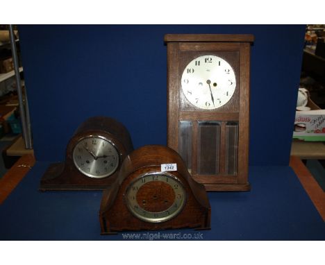 Two Napoleon shaped mantle Clocks and a wall Clock with plates.