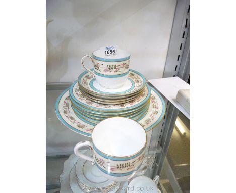 A Wedgwood part Teaset comprising two cups, four saucers, five side plates and bread/butter plate, each with two rings of pal
