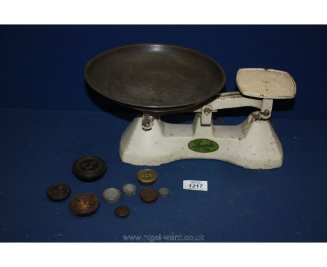 A set of old fashioned weighing Scales plus weights.
