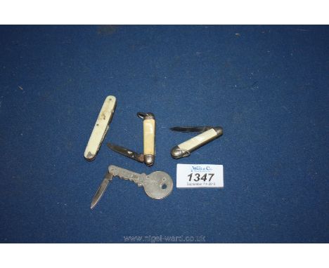 Three small Penknives together with a key made into a pocket knife inscribed Richards Lamp Post 