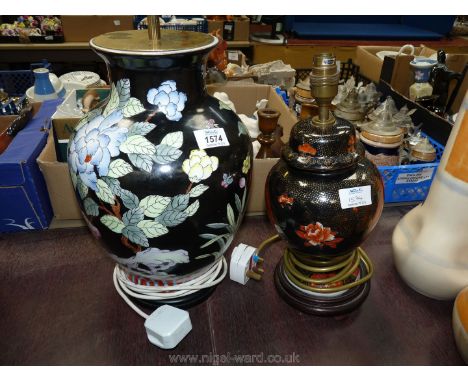 A large black floral table Lamp and a black and orange table Lamp, a/f