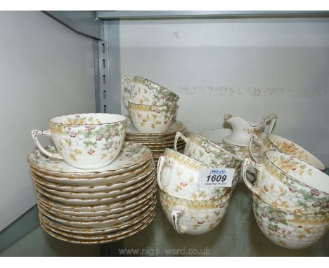 A Samuel Radford (1880-1891) Teaset including eleven cups and saucers, etc.