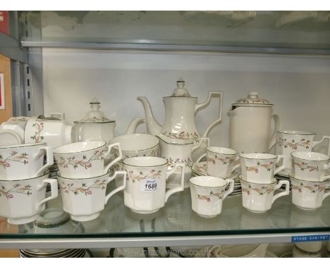 A Johnson Brothers Tea and Coffee set, 'Eternal Beau' pattern, including teapot, eight tea cups, ten saucers, five tea plates