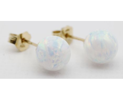 Paar Opal-Ohrstecker. Brisur und Sicherung 585/000 GG. Opalkugel, D. ca. 9 mm.