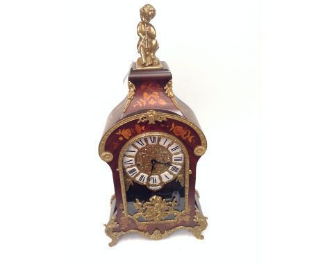 LARGE MARQUETRY INLAID CHIMING MANTEL CLOCK with Roman numeral chaper ring and black steel hands, with elaborately engraved b