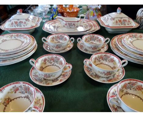 A Copeland Spode Royal Jasmine part-dinner service, comprising: two covered tureens, a set of three graduated oval dishes, di