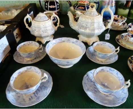 A Victorian part-tea service, comprising: teapot, twin handled covered sugar bowl, four cups & saucers and a large open bowl,