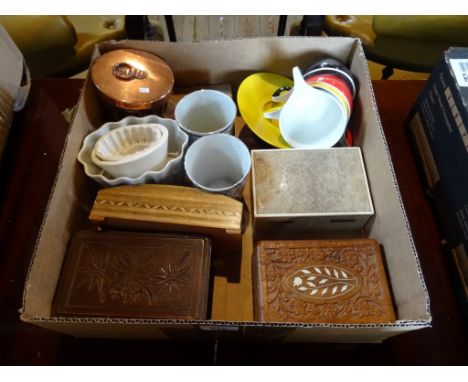 Three late 19th/early 20th century ceramic jelly moulds, together with a copper and brass lidded jelly mould, two late Victor