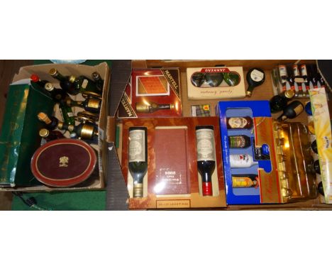 Two boxes containing a quantity of assorted miniature wines and spirits, to include: Martell Brandy, Courvoisier Cognac, Bord