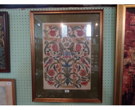 A framed and glazed tapestry of a stylized foliate and bird design, (57cm x 40cm), glazed in a gilt frame.