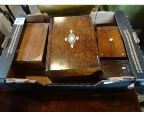 A walnut and mother of pearl inlaid box, together with three further boxes.