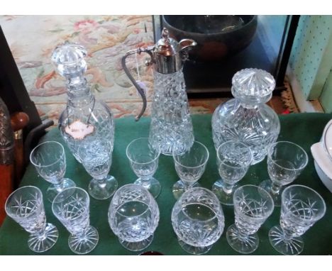 A cut glass decanter with ceramic Aynsley China label, together with a quantity of other cut and pressed glass.