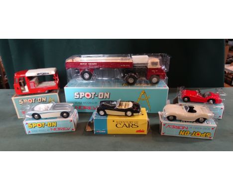 A Tri-ang Spot-On die-cast model no. 122 of a United Dairy's Milk Float (boxed), together with four later Norev boxed Spot-On