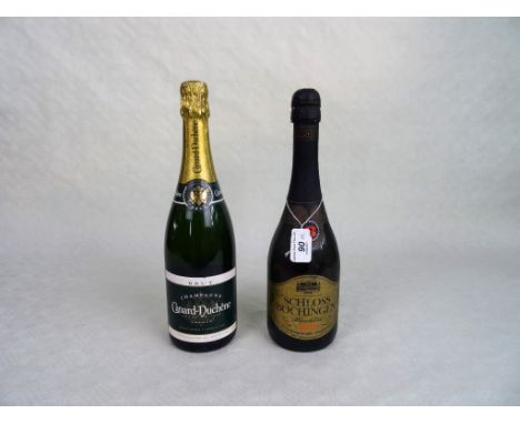 A bottle of Canard-Duchêne Champagne, 750ml, together with a bottle of Schloss Bochingen sparkling wine