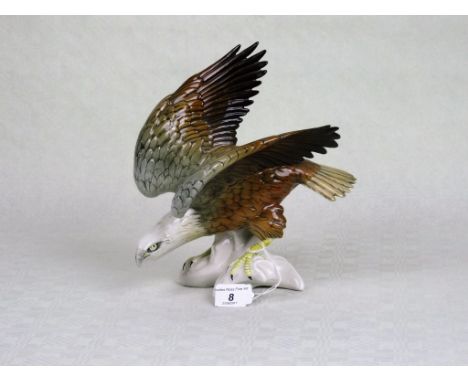 A Karl Ens ceramic model of an eagle, blue printed mark to base, (25cm).