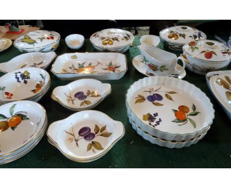 A quantity of Royal Worcester Evesham pattern tableware, to include: covered tureens, dessert bowls, a sauce boat, pie dishes