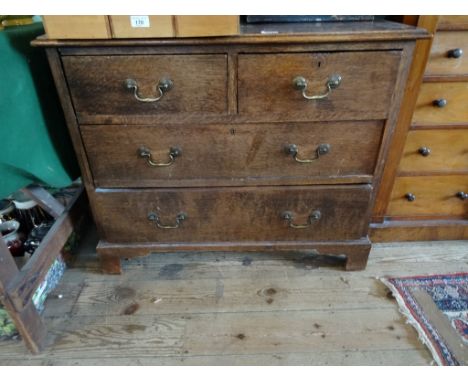 A 19th century oak chest, having two short over two long drawers on bracket feet, (92cm wide).