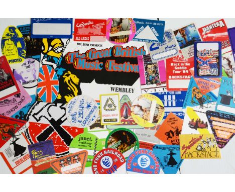Concert  Passes, forty plus including Michael Jackson, Madonna, Genesis, Fleetwood Mac, Stevie Nicks, Van Morrison, Ten Years
