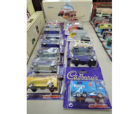 Sixteen Majorette die-casts including Cadbury's collection all on window display cards and a Corgi die-cast, The Cumbrian set