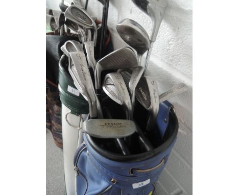 A golf bag and clubs including Dunlop Talent putter 