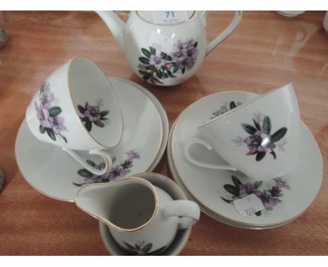 A tea for two service white with floral design