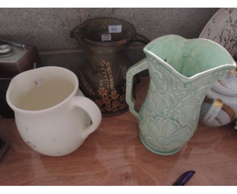 A selection of jugs including studio pottery, Kensington Sunflower etc