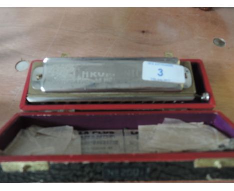 A boxed M Hohner Super Chromonica No2601/2 Harmonica