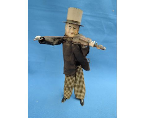 An early 20th century Fernand Martin tinplate & clockwork toy modelled as a violin player wearing top hat , brown jacket and 
