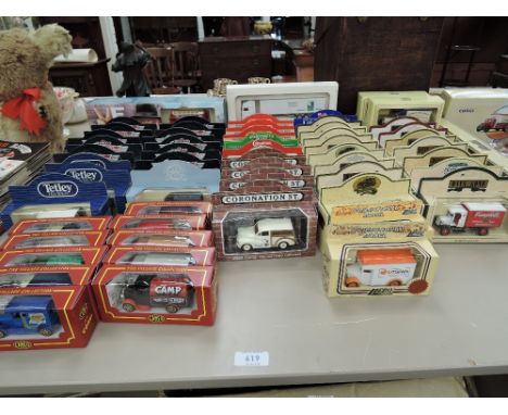 A collection of Lledo and Cameo from Corgi die-cast advertising vehicles, all in window display boxes