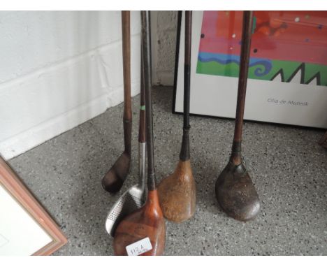 Five vintage golf clubs including wedge stamped G Smith Lossiemouth