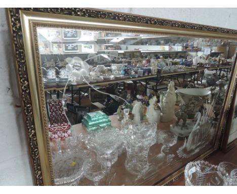 A gilt framed etched mirror 